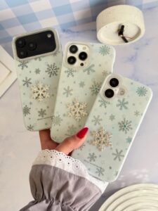 قاب ژله‌ای طرح برف و ستاره گوشی آیفون 16 پرومکس