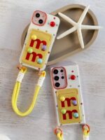 قاب آیفون 13 جاکارتی دار شکلاتی برجسته M&M بند دار
