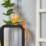 قاب گوشی آیفون 13 پرو طرح M&M با آویز