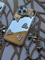 قاب آینه ای قلب کرومی با آویز گوشی آیفون مدل iPhone 15promax