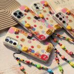 قاب گوشی آیفون 15 پرومکس طرح M&M با آویز