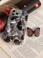 قاب پروانه مشکی همراه با پاپ سوکت گوشی آیفون 12 پرومکس