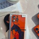 قاب هرمس طرح هنری نارنجی گوشی آیفون 13 و آیفون 14