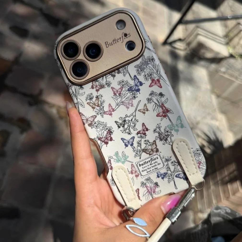 قاب بند دار طرح پروانه های رنگی گوشی آیفون 17 1 قاب بند دار طرح پروانه های رنگی گوشی آیفون 17